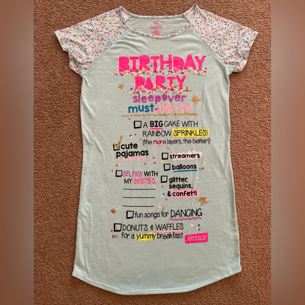 Justice, girls size 16/18, main color is light blue, with pink, yellows, purple